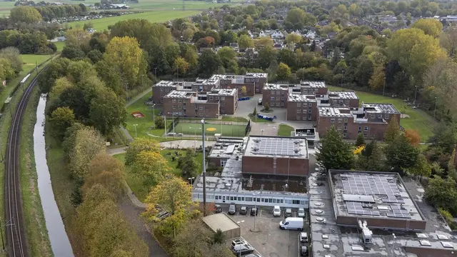 Logo van AZC Heerhugowaard